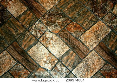 Decorative wall with rectangel stones. brown texture