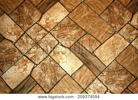Decorative wall with rectangel stones. brown texture