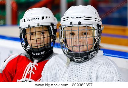Grodno Belarus - October 17 2017: Ice hockey practice with player and coach during a drill