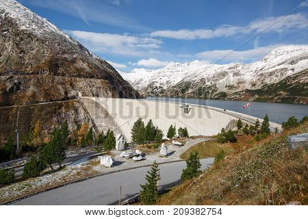 Koelnbrein Dam and the dam's reservoir in the Hohe Tauern range within federal state of Carinthia, Austria.
