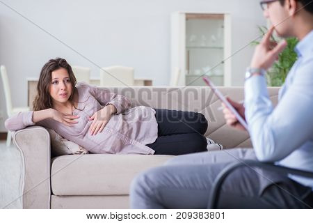 Pregnant woman visiting psychologist doctor