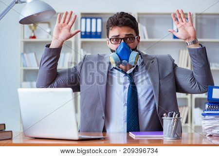 Businessman sweating excessively smelling bad in office at workp