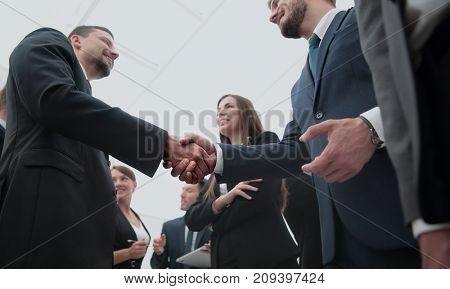 Business handshake. Business handshake and business people conce