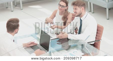 Closeup photo young business managers working with new startup 