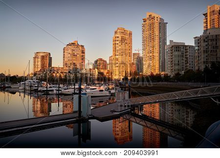 Yaletown Dawn, Vancouver. Morning sun reflects off Yaletown condominiums in downtown Vancouver. British Columbia, Canada.