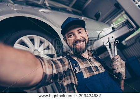 Attractive Brunet Bearded Automotive Expert With Beaming Smile Makesphoto With Metal Mechanical Keys