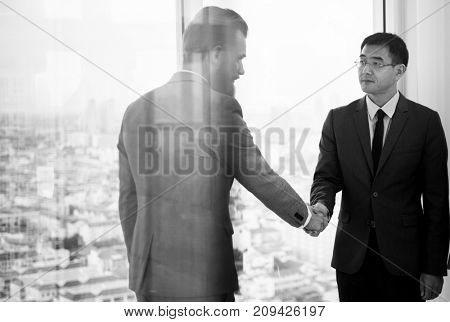 Corporate business people handshaking