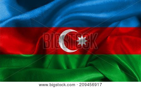 Realistic flag of Azerbaijan on the wavy surface of fabric. This flag can be used in design.