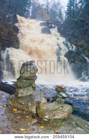 Falls in park in the Karelia, in clear summer day
