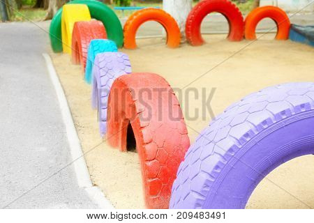 Use of old tires on children playground