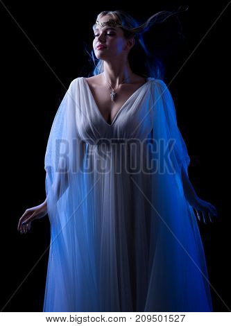 Young elven woman isolated on black