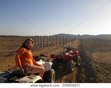 riding on ATVs in the desert is an active pastime