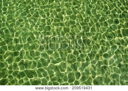 Abstract picture of light-figures in the water.