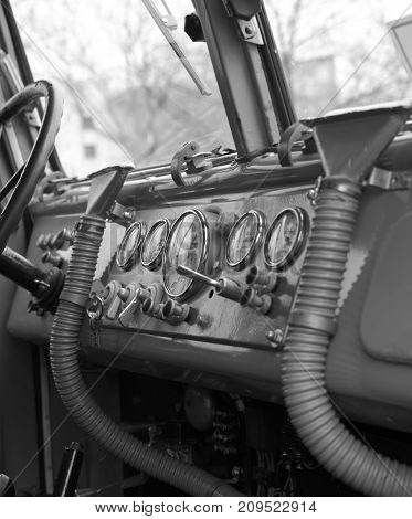 Old truck from the '50s, dashboard with gauges.