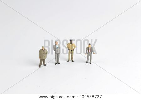 Mini Model Group Of Investor Standing Together