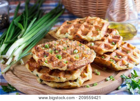 Fresh baked potato waffles on the table