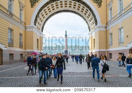 SAINT PETERSBURG RUSSIA - MAY 1 2017: Unknown people walk along Bolshaya Morskaya Street in historical center of St. Petersburg Russia