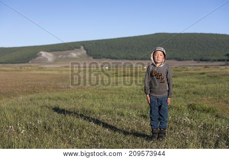 Huvsgul Mongolia 4th September 2017: Mongolian Kid In A Landscape Of Northern Mongolia