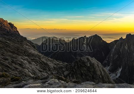 View from the top of the majestic mount Kinabalu in Kinabalu national,Sabah during morning sunrise.Its the highest mountain in Malaysia is one of Borneo's most popular tourist attractions & climbers.
