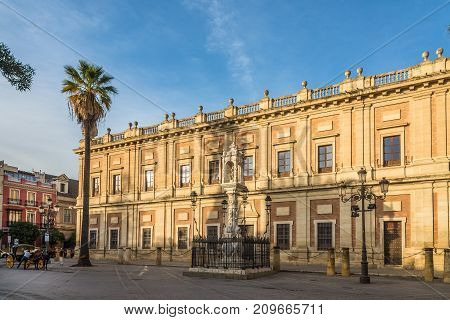 SEVILLA,SPAIN - OCTOBER 1,2017 - View at the building General Archive of the Indies in Sevilla. Sevilla is situated on the plain of the river Guadalquivir.