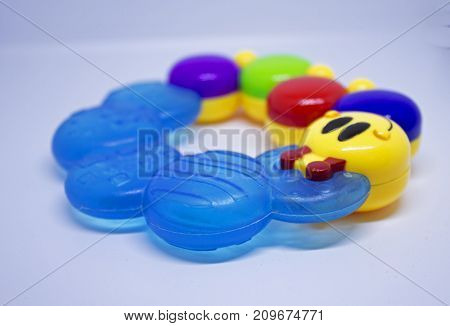 Plastic and silicon baby rattle for theething with caterpillar