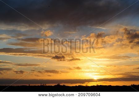 Eerie Sky over Friesland during the early evening. sunset.
