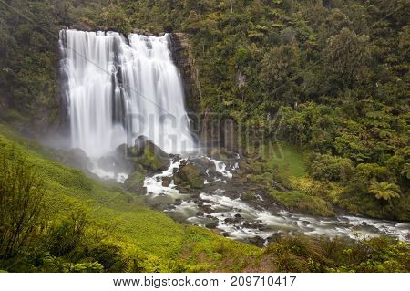 Marokopa Falls near Waitomo with heavy flow of water after winter storms.