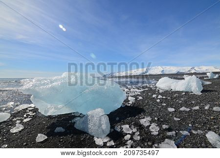 Breaktaking view of glacial ice on the beach of Iceland