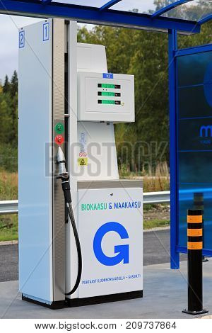 JYVASKYLA FINLAND - SEPTEMBER 22 2017: Natural gas dispenser at Gasum filling station in Jyvaskyla Finland. The station offers CNG biogas and LNG for both cars and heavy duty vehicles.