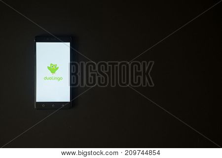 Los Angeles, USA, october 19, 2017: Duolingo logo on smartphone screen on black background.