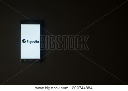Los Angeles, USA, october 19, 2017: Expedia logo on smartphone screen on black background.