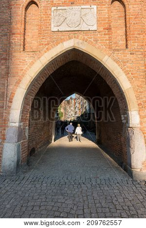 Mariacka street entrance to old town of Gdansk, Poland. The archway leads to a famous tourist road