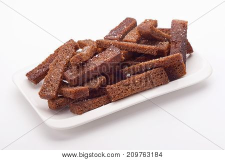 Fried Crackers Of Brown Bread Isolated On White Background
