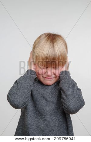 Cute vertical photo of handsome happy child