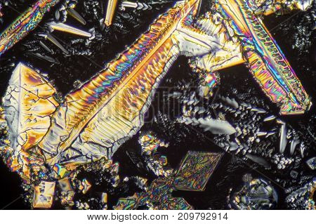 colorful microscopic shot of Sodium nitrate microcrystals in polarized light