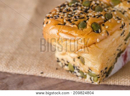 fresh bread and wheat on the wooden