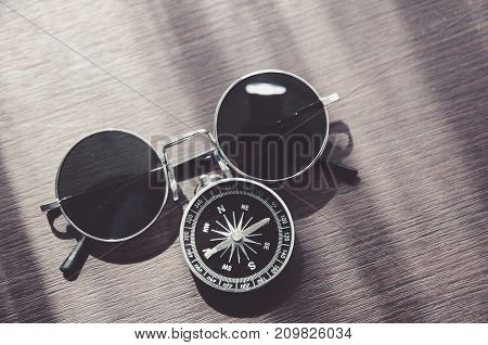 Vintage compass on the very old paper or letter envolop