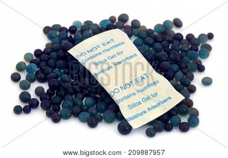 Silica gel used as absorbent of moisture over white background