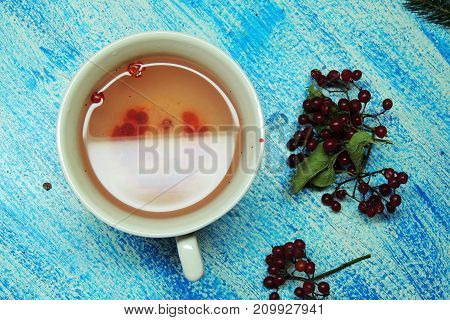 Hot tea viburnum. Tea viburnum in a glass cup.