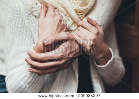 her husband gently hugs her girlfriend tenderly