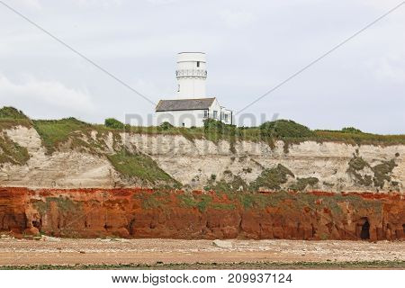 Lighthouse on the cliffs above Old Hunstanton Beach, Norfolk