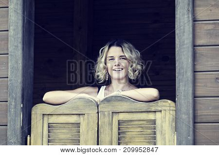 Portrait of a girl in a summer park outdoors