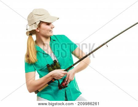 Fishery spinning equipment angling sport and activity concept. Happy smiling woman with fishing rod.