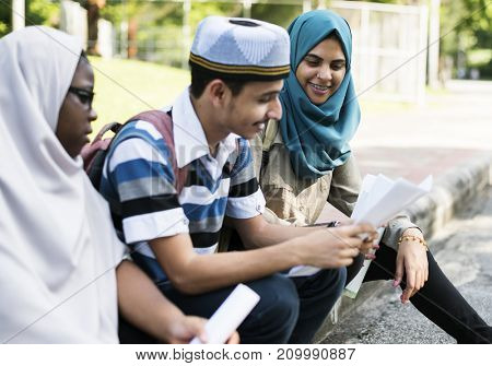 Diverse children studying outdoor