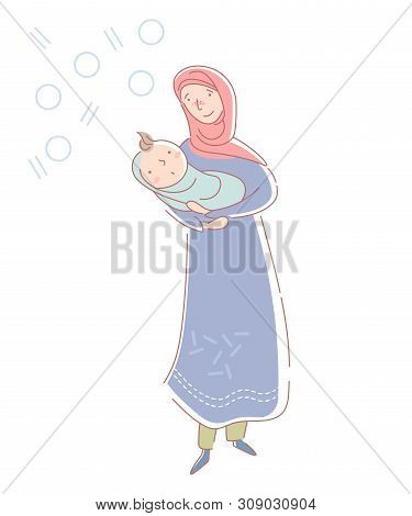 Loving Young Muslim Mother Wearing A Headscarf And Traditional Musllim Dress Cradling A Newborn Baby