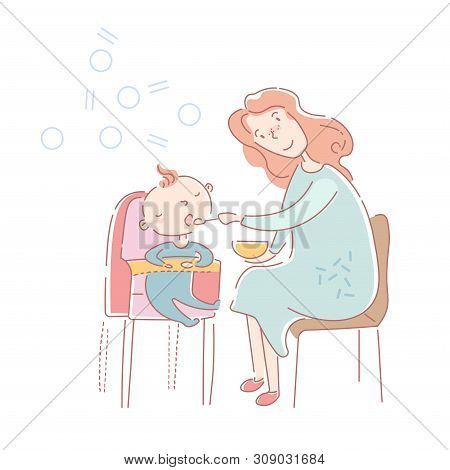 Loving Young Mother Feeding Her Baby In A High Chair With Spoonfuls Of Formula From A Bowl In A Conc