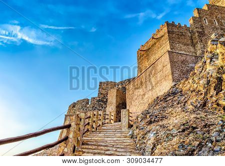 Stone Staircase To The Famous Muttrah Fort With Blue Sky Background. From Muscat, Oman.