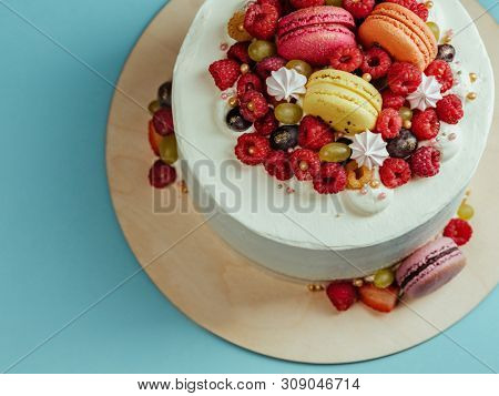 top view of naked cake with fresh berries
