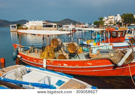 Crete, Elounda, June 07, 2017: Ships And Fishing Boats In The Harbor Of Elounda, Crete, Greece