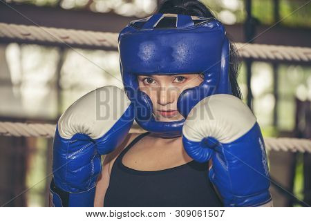 Boxing Woman Prepare To Trianing Session And Kickboxing,workout At Thai Boxing Gym.fit Female Exerci